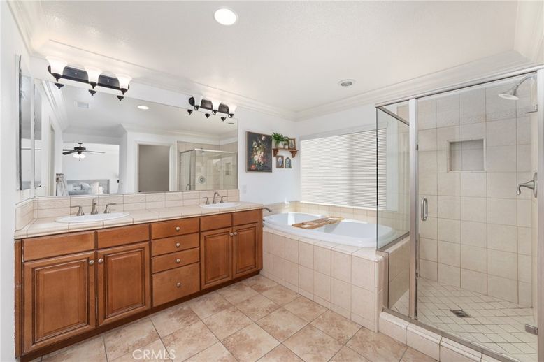 Bathroom, Dual Sink Vanities, Glass Shower, Interior, Recessed Lighting, Tile Countertops