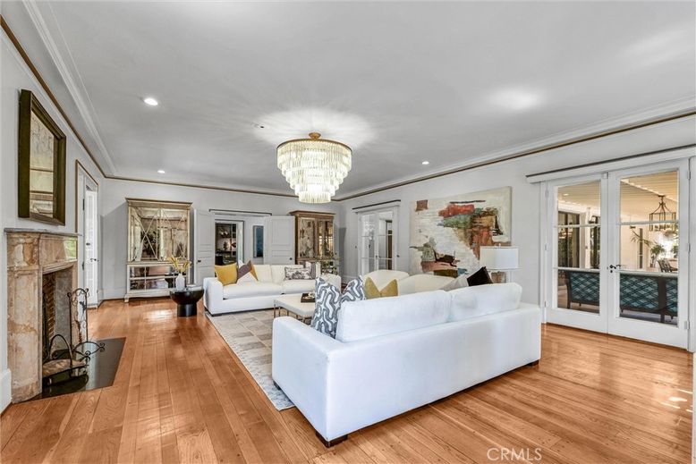 Chandelier, Fireplace, Interior, Living room, Recessed Lighting, Wood Texture Flooring