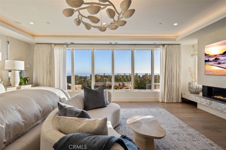 Bedroom, Fireplace, Interior, Living room, Recessed Lighting, Water, Wood Texture Flooring