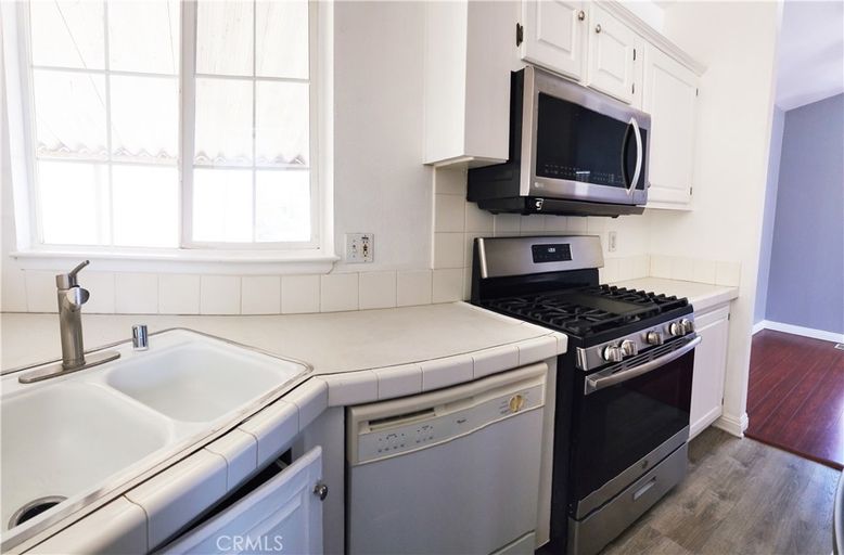 Interior, Kitchen, Tile Countertops, Wood Texture Flooring