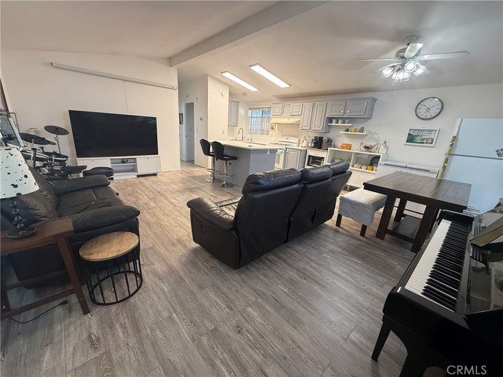 Dining room, Interior, Kitchen, Living room, Piano, Recessed Lighting, Wood Texture Flooring