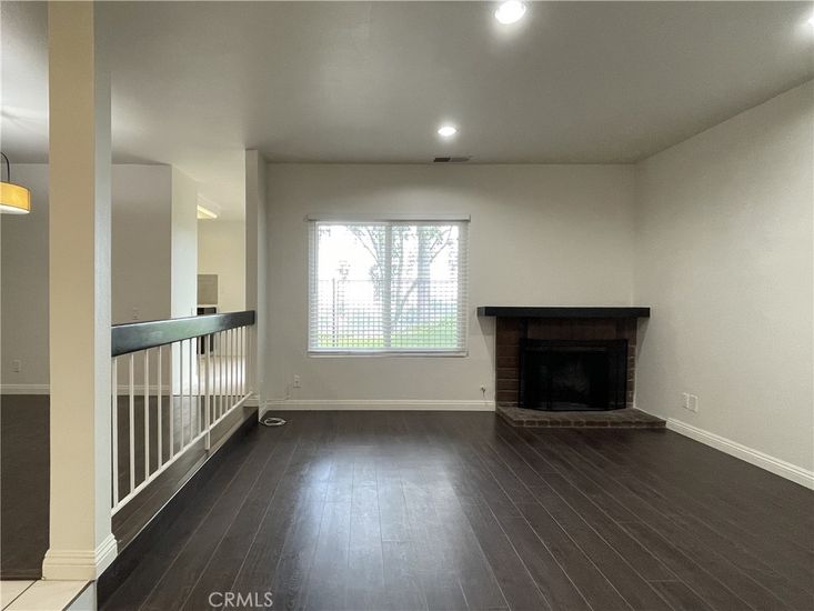 Empty room, Fireplace, Interior, Pendant Lights, Recessed Lighting, Wood Texture Flooring