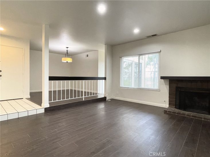 Fireplace, Interior, Pendant Lights, Recessed Lighting, Wood Texture Flooring