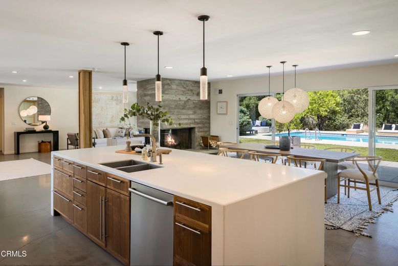 Dining room, Fireplace, Interior, Kitchen, Living room, Pendant Lights, Recessed Lighting, Stainless Steel Appliances, Stone Walls