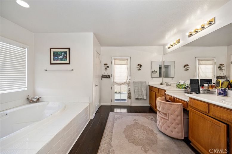 Bathroom, Dual Sink Vanities, Interior, Recessed Lighting, Wood Texture Flooring