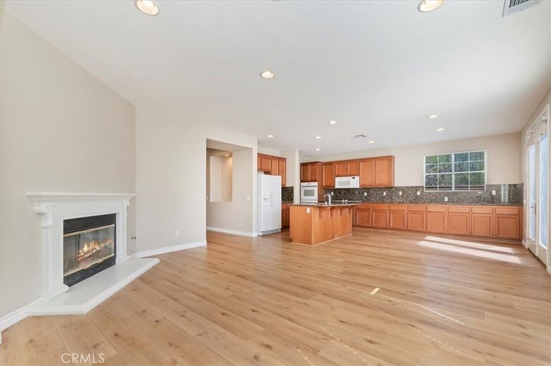 Empty room, Fireplace, Interior, Kitchen, Recessed Lighting, Wood Texture Flooring