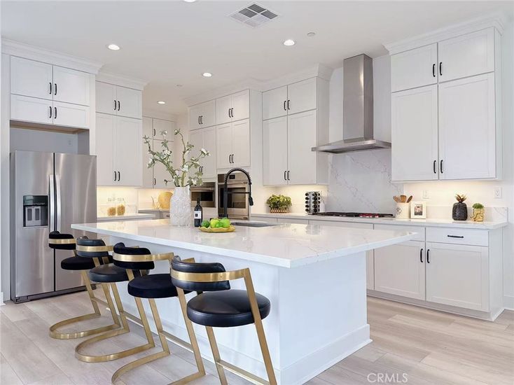 Interior, Kitchen, Marble Walls, Recessed Lighting, Stainless Steel Appliances, Wood Texture Flooring