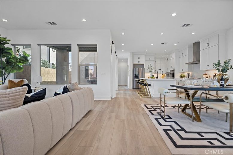 Dining room, Interior, Kitchen, Living room, Recessed Lighting, Stainless Steel Appliances, Wood Texture Flooring