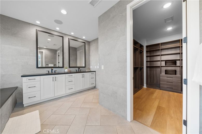 Bathroom, Dual Sink Vanities, Interior, Recessed Lighting, Walk-in Closets, Wood Texture Flooring