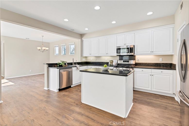 Chandelier, Interior, Kitchen, Recessed Lighting, Stainless Steel Appliances, Wood Texture Flooring
