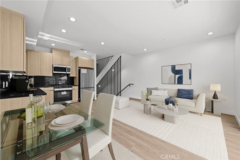 Dining room, Interior, Kitchen, Living room, Recessed Lighting, Stainless Steel Appliances, Wood Texture Flooring
