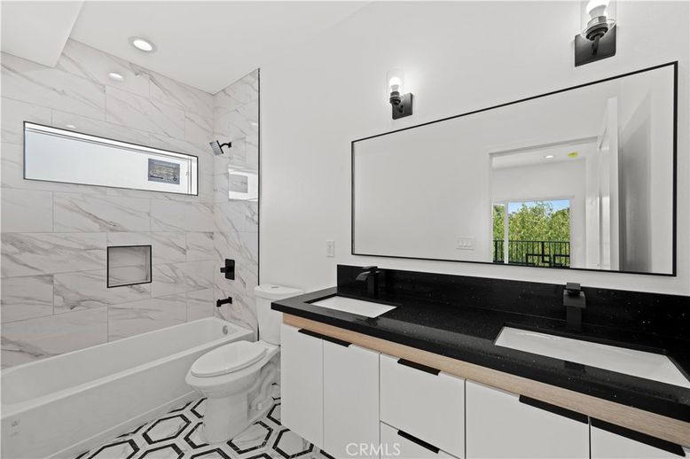 Bathroom, Dual Sink Vanities, Interior, Marble Walls, Recessed Lighting