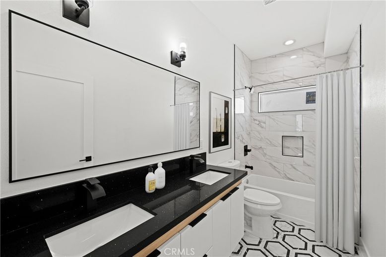 Bathroom, Dual Sink Vanities, Interior, Marble Walls, Recessed Lighting
