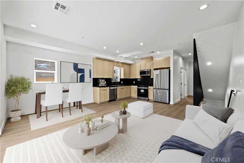 Dining room, Interior, Kitchen, Living room, Recessed Lighting, Stainless Steel Appliances, Wood Texture Flooring