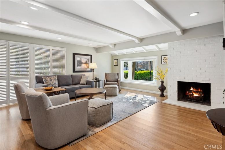 Fireplace, Interior, Living room, Recessed Lighting, Stone Walls, Wood Texture Flooring