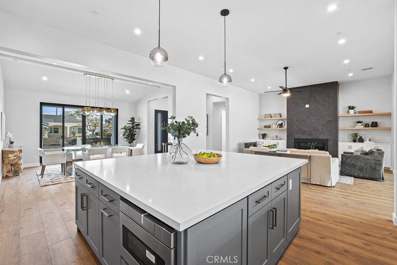 Dining room, Fireplace, Interior, Kitchen, Living room, Pendant Lights, Recessed Lighting, Wood Texture Flooring