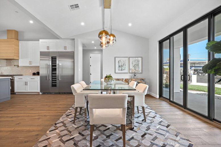 Dining room, Interior, Kitchen, Pendant Lights, Recessed Lighting, Stainless Steel Appliances, Wood Texture Flooring
