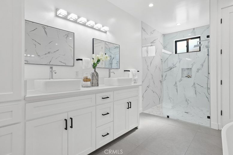 Bathroom, Dual Sink Vanities, Glass Shower, Interior, Marble Walls, Recessed Lighting