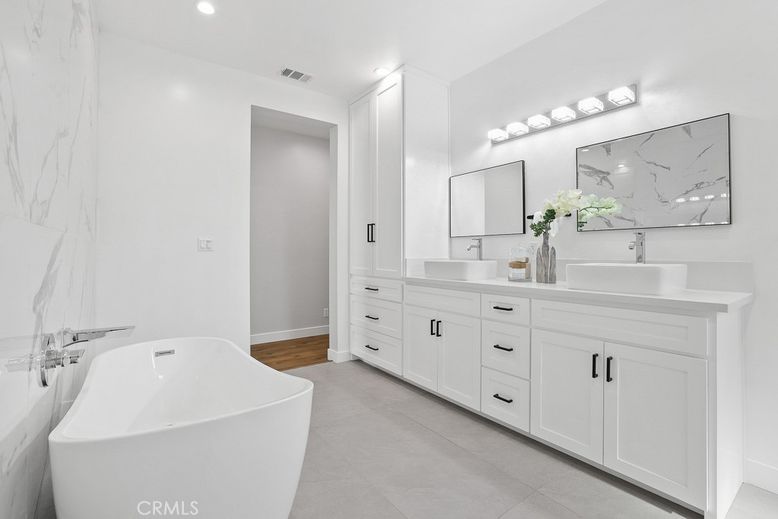 Bathroom, Dual Sink Vanities, Free Standing Baths, Interior, Marble Walls, Recessed Lighting