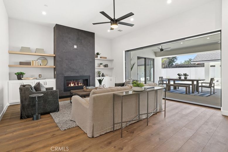 Dining room, Fireplace, Interior, Living room, Recessed Lighting, Wood Texture Flooring