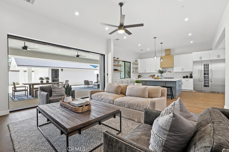 Dining room, Interior, Kitchen, Living room, Pendant Lights, Recessed Lighting, Stainless Steel Appliances, Wood Texture Flooring
