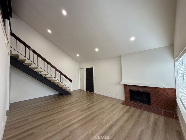Empty room, Fireplace, Interior, Recessed Lighting, Wood Texture Flooring