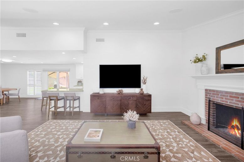 Dining room, Fireplace, Interior, Living room, Recessed Lighting, Wood Texture Flooring