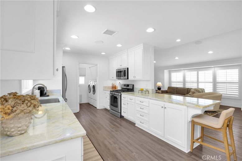 Interior, Kitchen, Living room, Recessed Lighting, Stainless Steel Appliances, Washer, Wood Texture Flooring