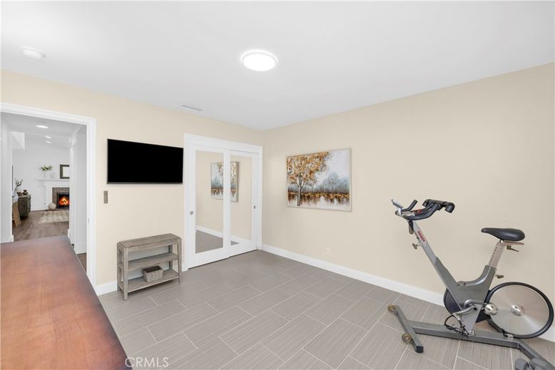 Fireplace, Fitness Equipment, Interior, Recessed Lighting, Wood Texture Flooring