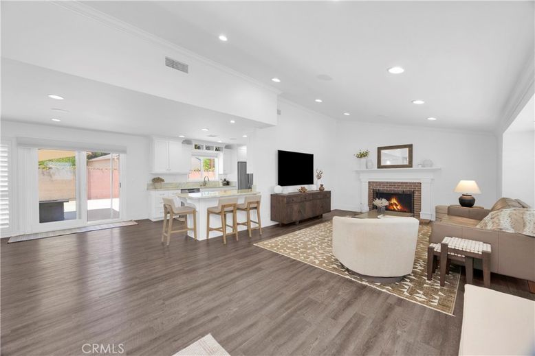 Dining room, Fireplace, Interior, Kitchen, Living room, Recessed Lighting, Wood Texture Flooring
