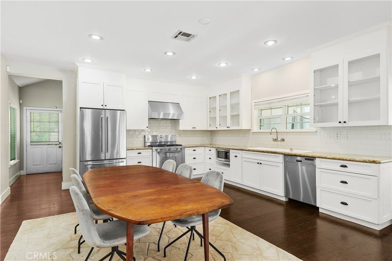 Dining room, Interior, Kitchen, Recessed Lighting, Stainless Steel Appliances, Wood Texture Flooring