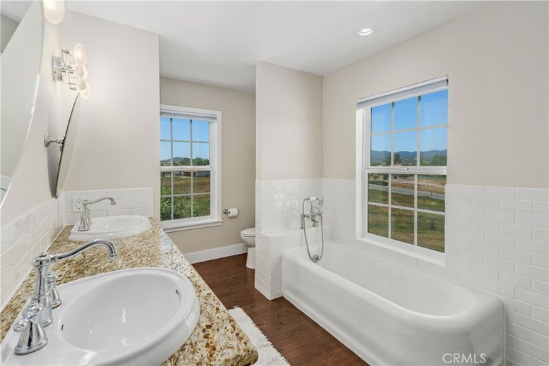Bathroom, Dual Sink Vanities, Interior, Recessed Lighting, Wood Texture Flooring