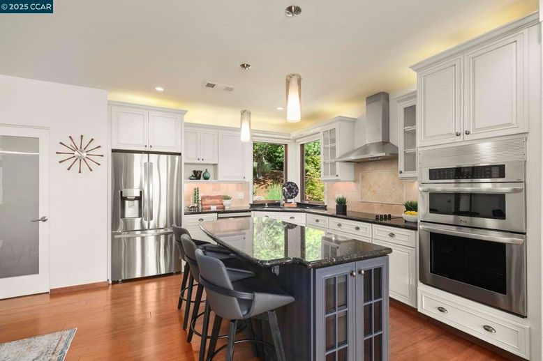 Interior, Kitchen, Pendant Lights, Recessed Lighting, Stainless Steel Appliances, Wood Texture Flooring