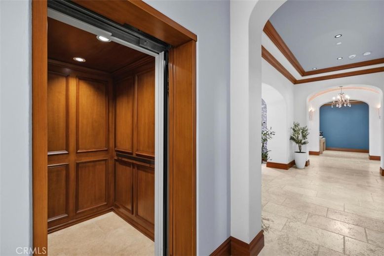 Chandelier, Elevator, Interior, Recessed Lighting, Wooden Walls