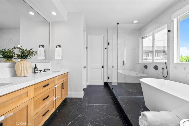 Bathroom, Dual Sink Vanities, Free Standing Baths, Glass Shower, Interior, Marble, Marble Walls, Recessed Lighting