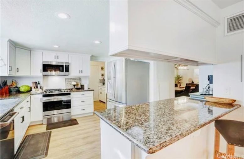 Chandelier, Interior, Kitchen, Recessed Lighting, Stainless Steel Appliances, Wood Texture Flooring