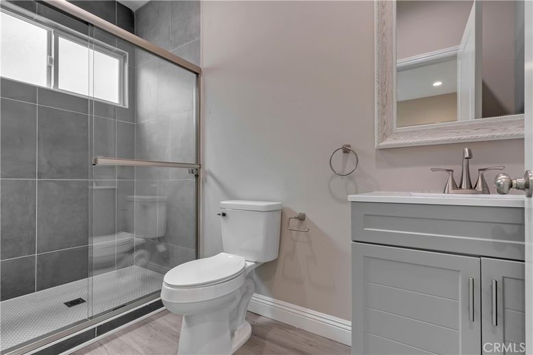 Bathroom, Glass Shower, Interior, Recessed Lighting, Wood Texture Flooring