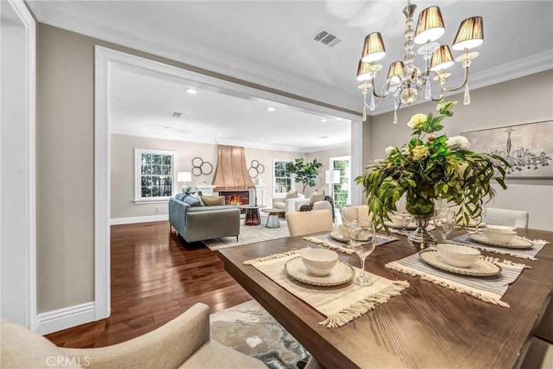 Chandelier, Dining room, Fireplace, Interior, Living room, Recessed Lighting, Wood Texture Flooring