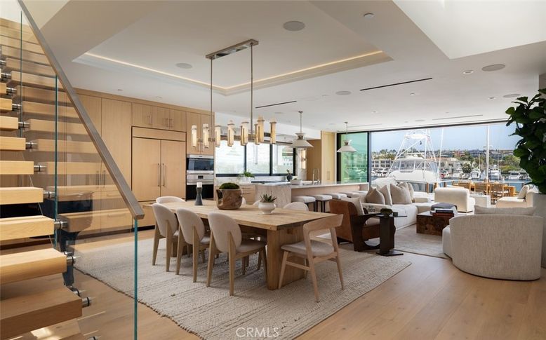 Dining room, Interior, Living room, Pendant Lights, Recessed Lighting, Stainless Steel Appliances, Wood Texture Flooring