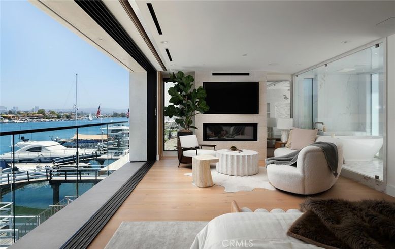 Fireplace, Interior, Living room, Recessed Lighting, Water, Wood Texture Flooring