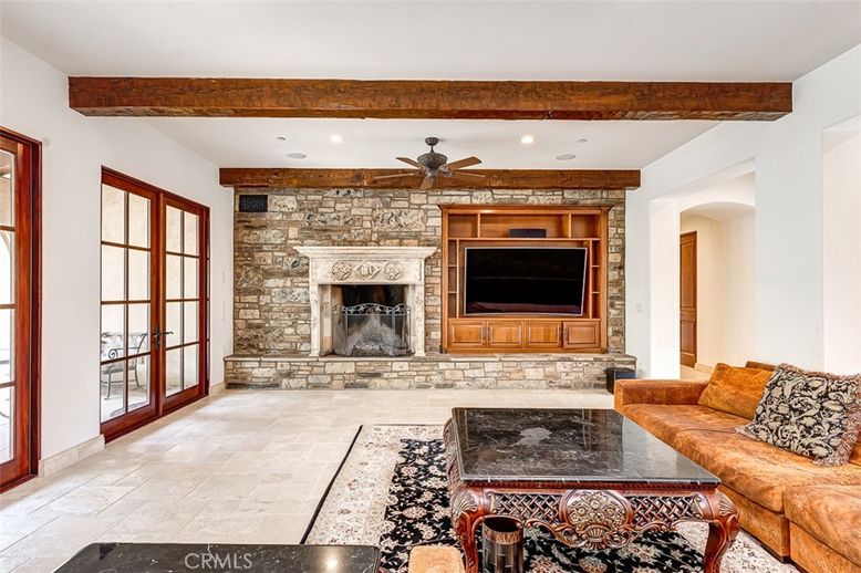 Fireplace, Interior, Living room, Recessed Lighting, Stone Walls, Wooden Beams