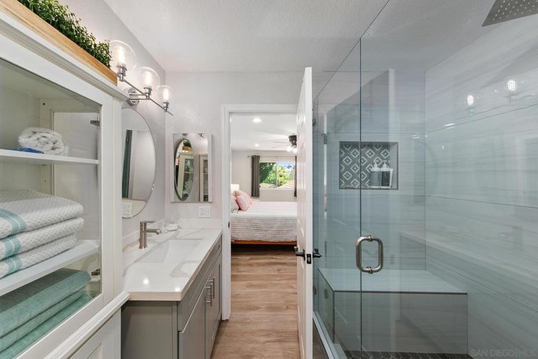 Bathroom, Bedroom, Dual Sink Vanities, Glass Shower, Interior, Recessed Lighting, Wood Texture Flooring