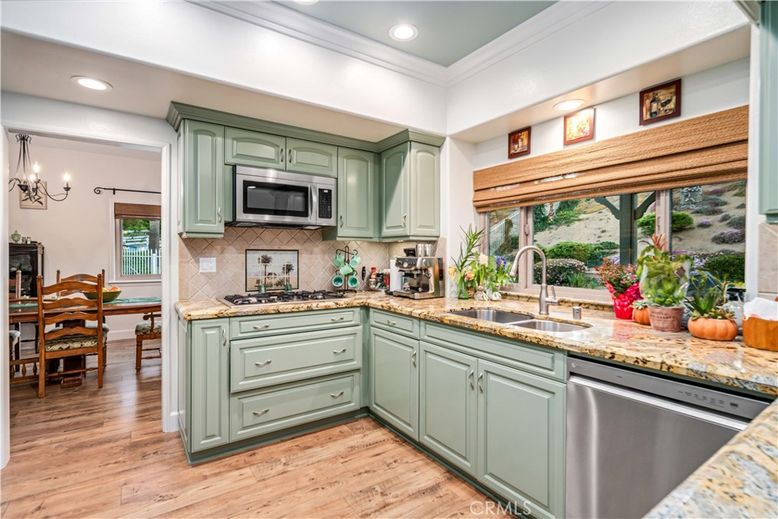 Chandelier, Dining room, Interior, Kitchen, Recessed Lighting, Stainless Steel Appliances, Wood Texture Flooring
