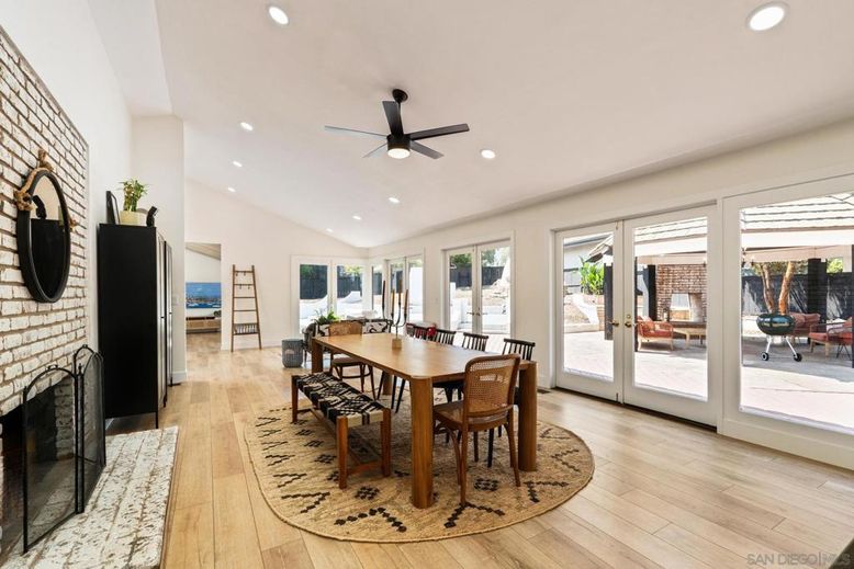 Dining room, Fireplace, Interior, Recessed Lighting, Stone Walls, Wood Texture Flooring