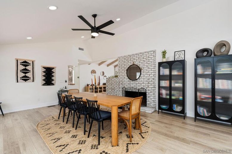 Dining room, Fireplace, Interior, Recessed Lighting, Stone Walls, Wood Texture Flooring