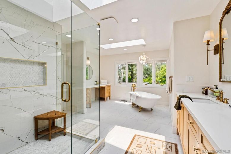Bathroom, Chandelier, Dual Sink Vanities, Free Standing Baths, Glass Shower, Interior, Marble, Marble Walls, Recessed Lighting