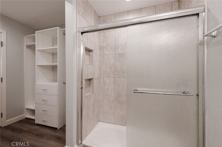 Bathroom, Glass Shower, Interior, Walk-in Closets, Wood Texture Flooring