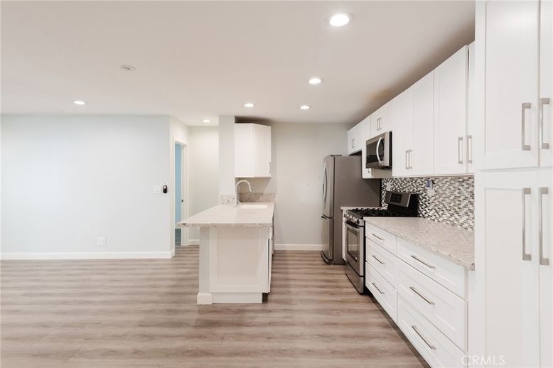 Interior, Kitchen, Recessed Lighting, Stainless Steel Appliances, Wood Texture Flooring