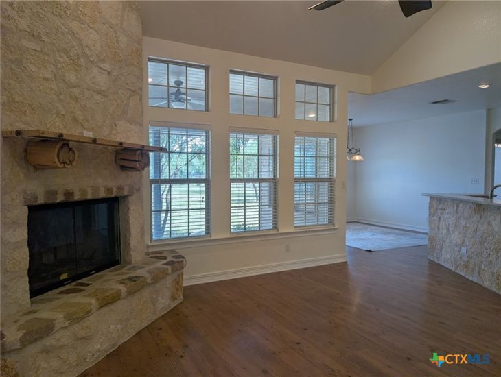 Empty room, Fireplace, Interior, Pendant Lights, Recessed Lighting, Wood Texture Flooring