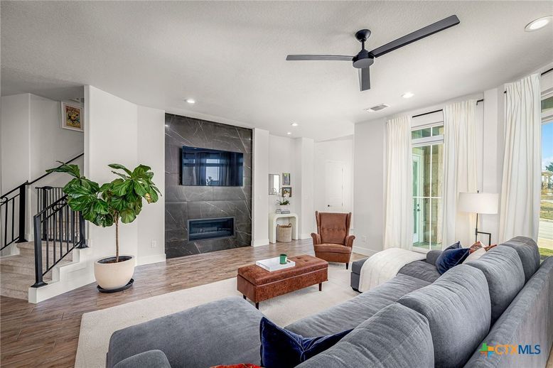 Fireplace, Interior, Living room, Recessed Lighting, Wood Texture Flooring